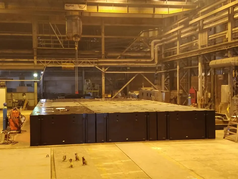 Welding work on barge hull plating in production yard