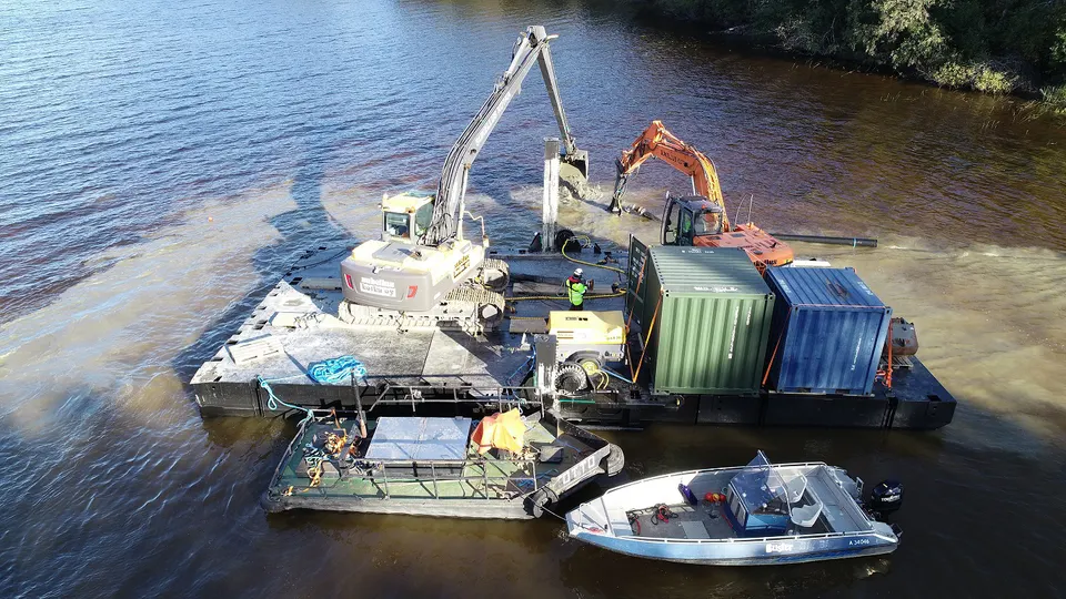 Aerial drone view of dredging barge in operation